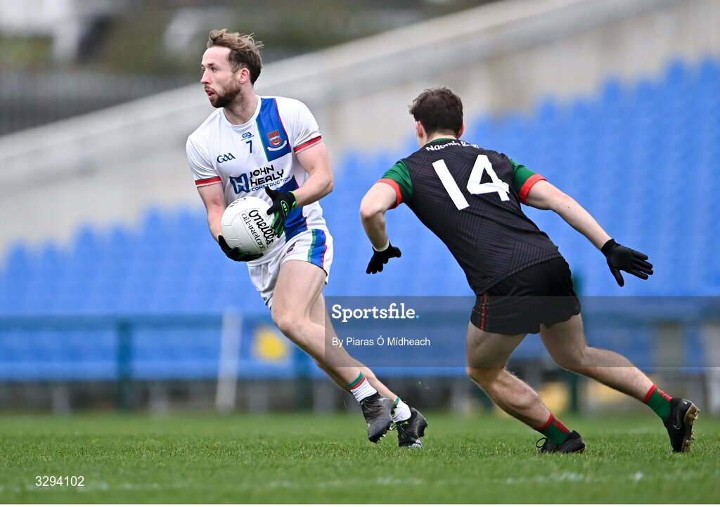 16 November 2025; David Tighe of Ballina Stephenites in action against Bobby Nugent of St Brigid's during the AIB Connacht GAA Football Senior Club Championship semi-final match between St Brigid's and Ballina Stephenites at King & Moffatt Dr Hyde Park in Roscommon. Photo by Piaras Ó Mídheach/Sportsfile
