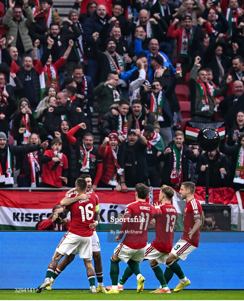 16 November 2025; Dániel Lukács of Hungary, 16, celebrates with teammates after scoring his side's first goal during the FIFA World Cup 2026 Group F Qualifier match between Hungary and Republic of Ireland at Puskás Aréna in Budapest, Hungary. Photo by Ben McShane/Sportsfile