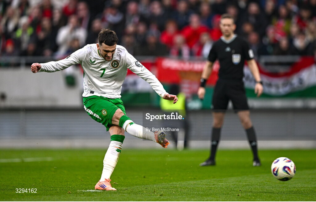 16 November 2025; Troy Parrott of Republic of Ireland scores his side's first goal, a penalty, during the FIFA World Cup 2026 Group F Qualifier match between Hungary and Republic of Ireland at Puskás Aréna in Budapest, Hungary. Photo by Ben McShane/Sportsfile