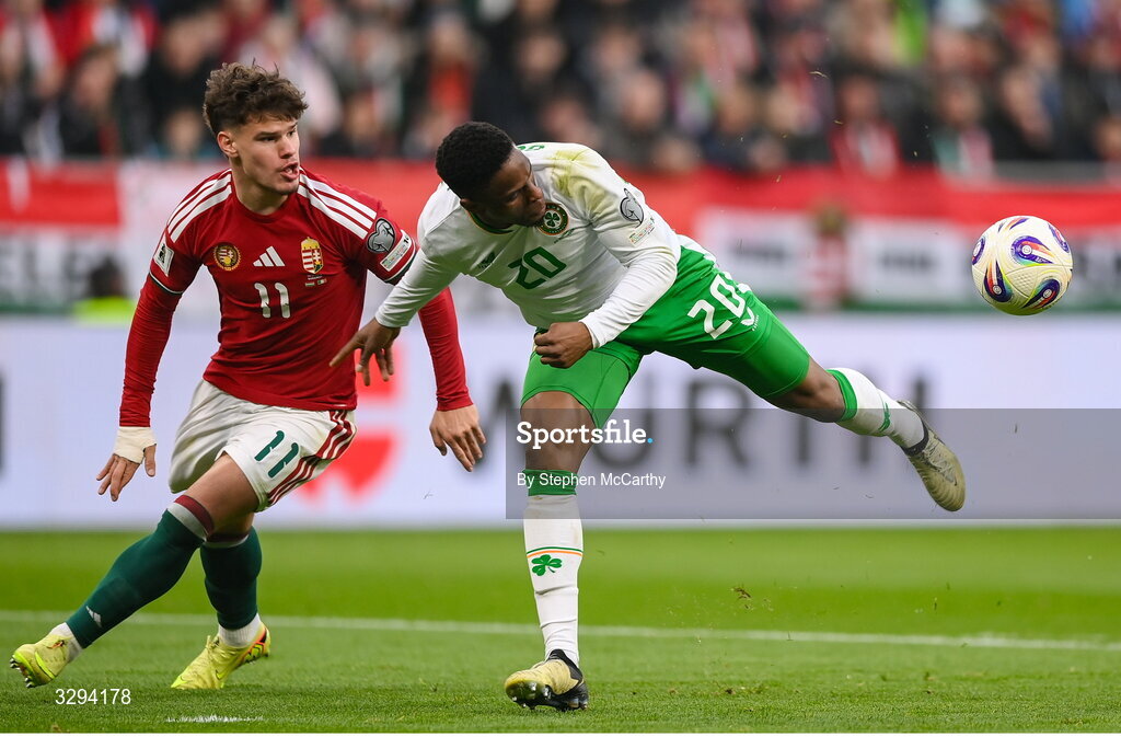 16 November 2025; Chiedozie Ogbene of Republic of Ireland and Milos Kerkez of Hungary during the FIFA World Cup 2026 Group F Qualifier match between Hungary and Republic of Ireland at Puskás Aréna in Budapest, Hungary. Photo by Stephen McCarthy/Sportsfile