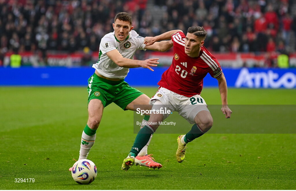 16 November 2025; Roland Sallai of Hungary in action against Dara O'Shea of Republic of Ireland during the FIFA World Cup 2026 Group F Qualifier match between Hungary and Republic of Ireland at Puskás Aréna in Budapest, Hungary. Photo by Stephen McCarthy/Sportsfile