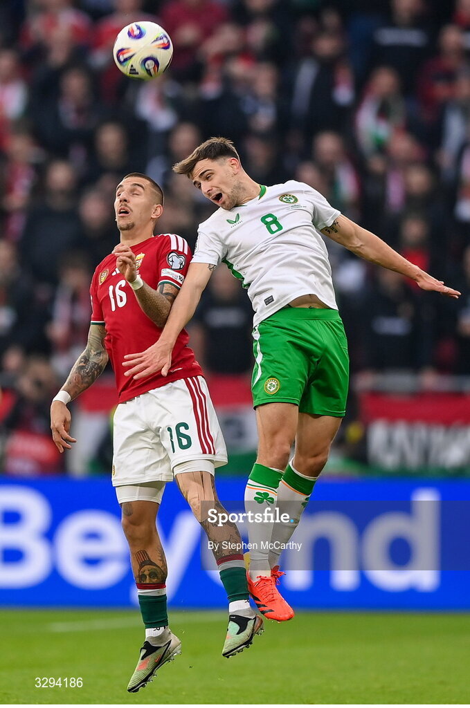 16 November 2025; Dániel Lukács of Hungary in action against Jayson Molumby of Republic of Ireland during the FIFA World Cup 2026 Group F Qualifier match between Hungary and Republic of Ireland at Puskás Aréna in Budapest, Hungary. Photo by Stephen McCarthy/Sportsfile