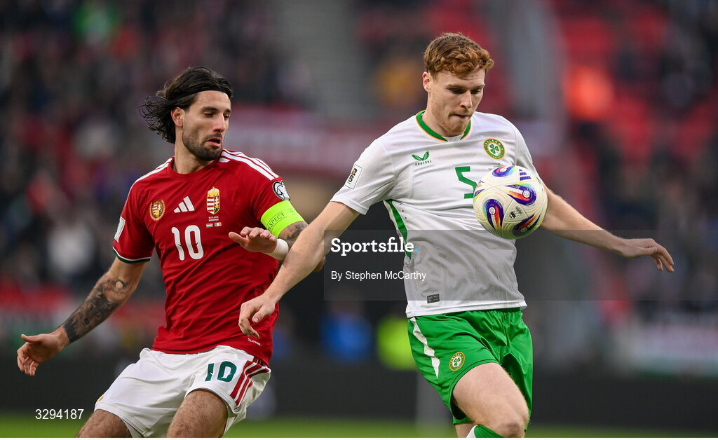 16 November 2025; Jake O'Brien of Republic of Ireland and Dominik Szoboszlai of Hungary during the FIFA World Cup 2026 Group F Qualifier match between Hungary and Republic of Ireland at Puskás Aréna in Budapest, Hungary. Photo by Stephen McCarthy/Sportsfile