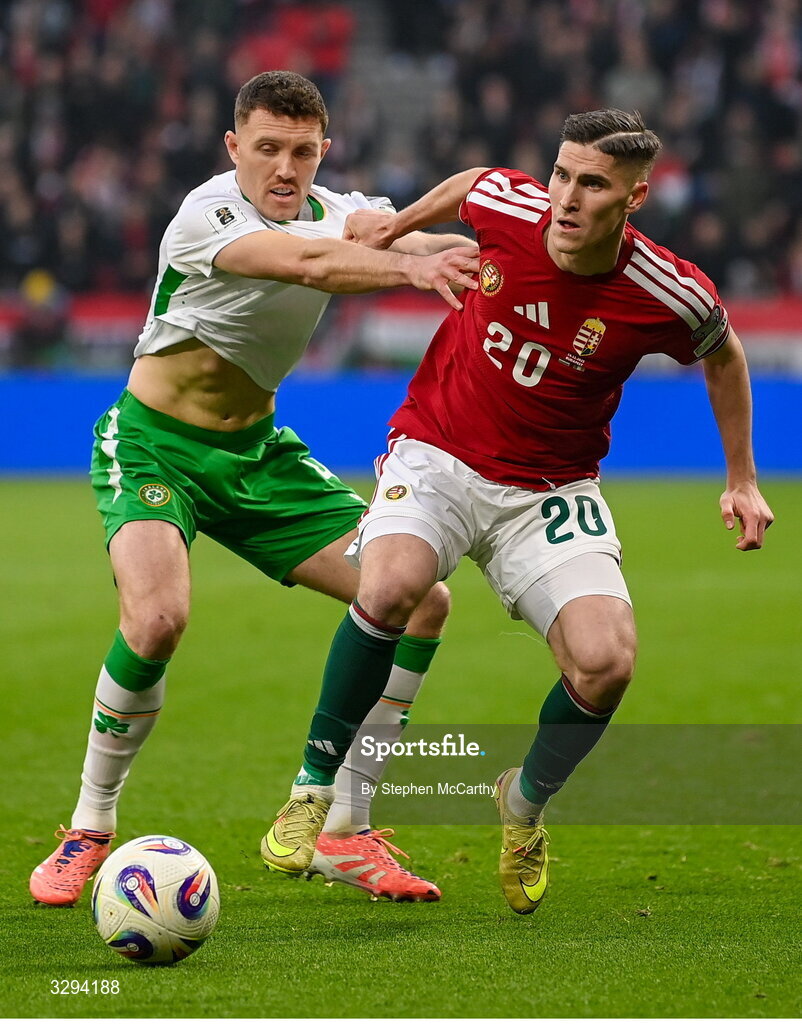 16 November 2025; Roland Sallai of Hungary in action against Dara O'Shea of Republic of Ireland during the FIFA World Cup 2026 Group F Qualifier match between Hungary and Republic of Ireland at Puskás Aréna in Budapest, Hungary. Photo by Stephen McCarthy/Sportsfile