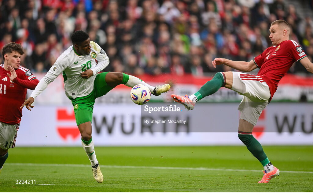 16 November 2025; Chiedozie Ogbene of Republic of Ireland is fouled by Attila Szalai of Hungary, resulting in a Republic of Ireland penalty, during the FIFA World Cup 2026 Group F Qualifier match between Hungary and Republic of Ireland at Puskás Aréna in Budapest, Hungary. Photo by Stephen McCarthy/Sportsfile