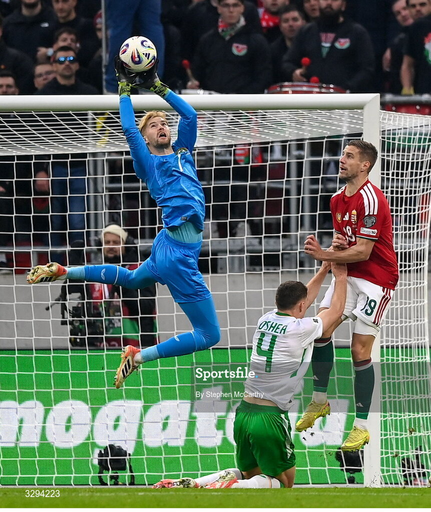 16 November 2025; Republic of Ireland goalkeeper Caoimhin Kelleher makes a save during the FIFA World Cup 2026 Group F Qualifier match between Hungary and Republic of Ireland at Puskás Aréna in Budapest, Hungary. Photo by Stephen McCarthy/Sportsfile