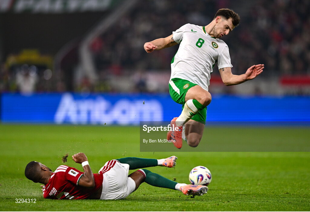 16 November 2025; Jayson Molumby of Republic of Ireland is tackled by Loïc Négo of Hungary during the FIFA World Cup 2026 Group F Qualifier match between Hungary and Republic of Ireland at Puskás Aréna in Budapest, Hungary. Photo by Ben McShane/Sportsfile