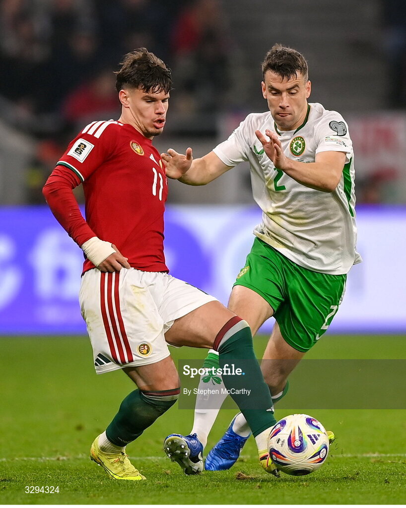 16 November 2025; Milos Kerkez of Hungary in action against Seamus Coleman of Republic of Ireland during the FIFA World Cup 2026 Group F Qualifier match between Hungary and Republic of Ireland at Puskás Aréna in Budapest, Hungary. Photo by Stephen McCarthy/Sportsfile