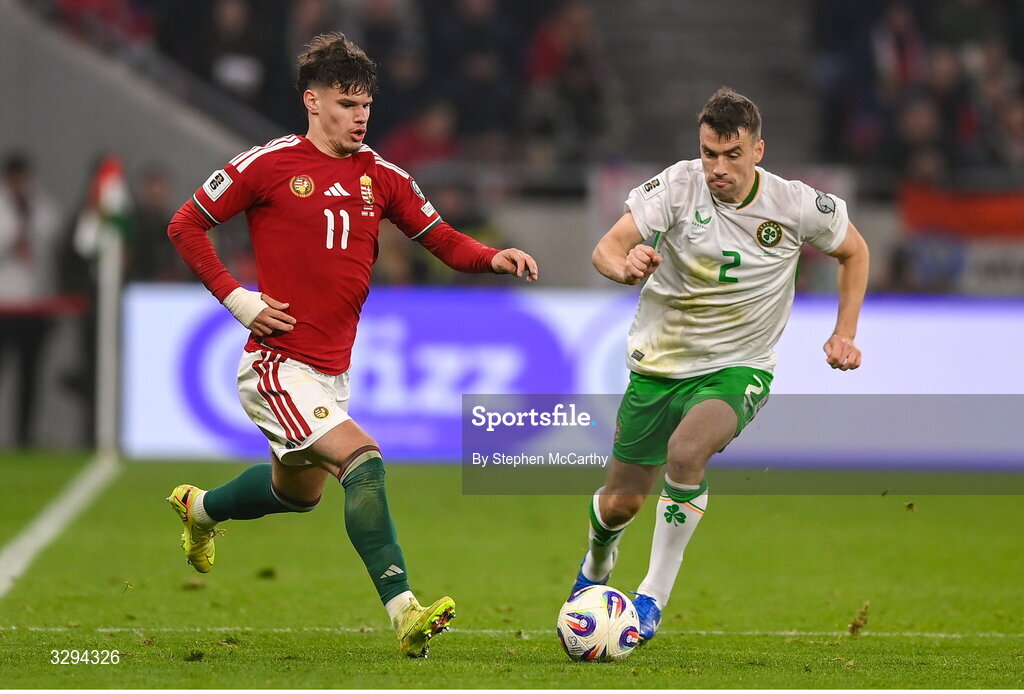 16 November 2025; Milos Kerkez of Hungary in action against Seamus Coleman of Republic of Ireland during the FIFA World Cup 2026 Group F Qualifier match between Hungary and Republic of Ireland at Puskás Aréna in Budapest, Hungary. Photo by Stephen McCarthy/Sportsfile