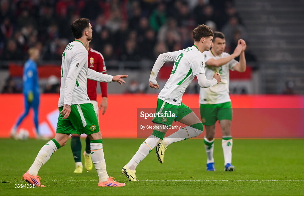 16 November 2025; Troy Parrott, left, and Johnny Kenny of Republic of Ireland during the FIFA World Cup 2026 Group F Qualifier match between Hungary and Republic of Ireland at Puskás Aréna in Budapest, Hungary. Photo by Stephen McCarthy/Sportsfile