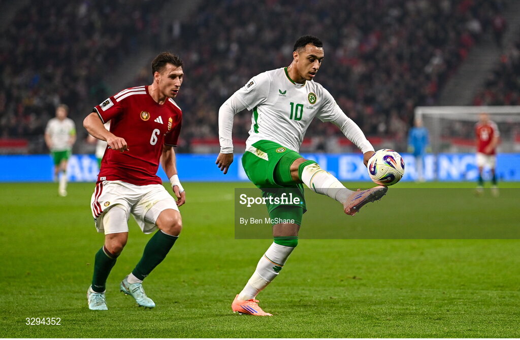 16 November 2025; Adam Idah of Republic of Ireland in action against Willi Orbán of Hungary during the FIFA World Cup 2026 Group F Qualifier match between Hungary and Republic of Ireland at Puskás Aréna in Budapest, Hungary. Photo by Ben McShane/Sportsfile