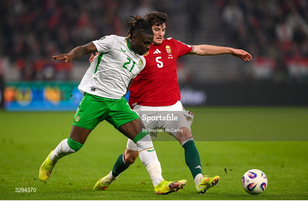 16 November 2025; Festy Ebosele of Republic of Ireland in action against Bence Ötvös of Hungary during the FIFA World Cup 2026 Group F Qualifier match between Hungary and Republic of Ireland at Puskás Aréna in Budapest, Hungary. Photo by Stephen McCarthy/Sportsfile