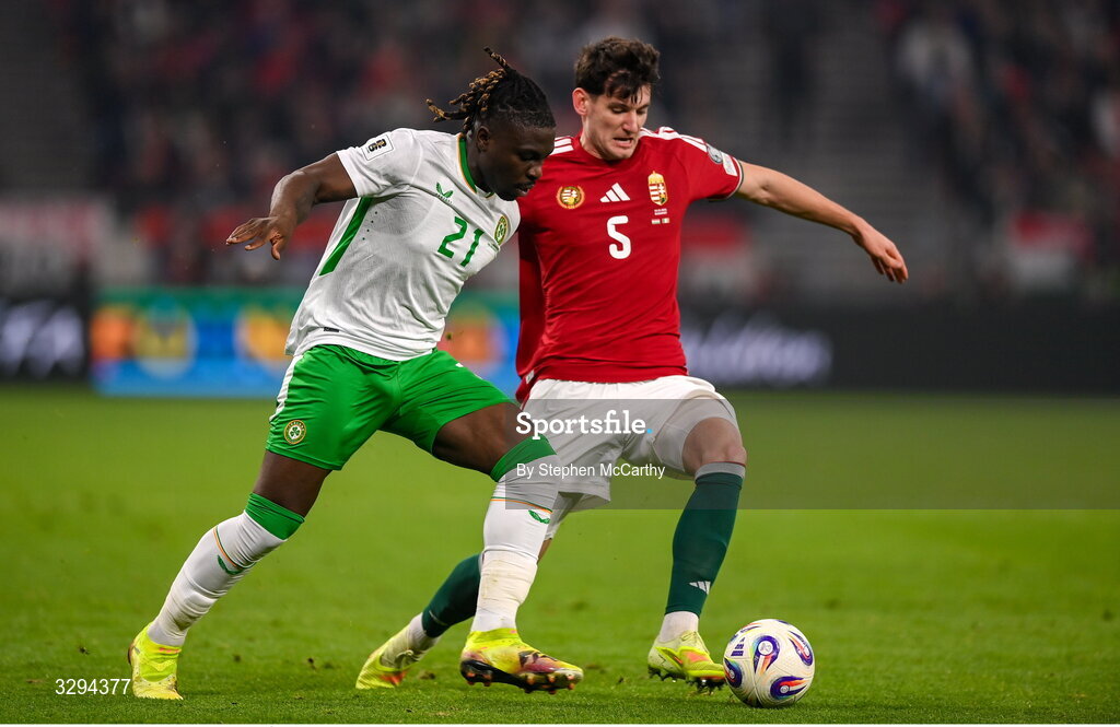 16 November 2025; Festy Ebosele of Republic of Ireland in action against Bence Ötvös of Hungary during the FIFA World Cup 2026 Group F Qualifier match between Hungary and Republic of Ireland at Puskás Aréna in Budapest, Hungary. Photo by Stephen McCarthy/Sportsfile