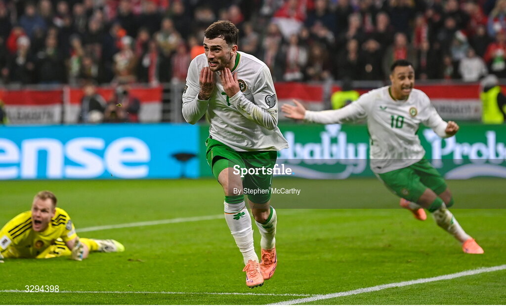 16 November 2025; Troy Parrott of Republic of Ireland celebrates after scoring his side's third goal during the FIFA World Cup 2026 Group F Qualifier match between Hungary and Republic of Ireland at Puskás Aréna in Budapest, Hungary. Photo by Stephen McCarthy/Sportsfile