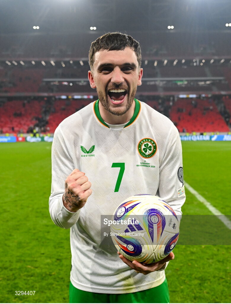 16 November 2025; Troy Parrott of Republic of Ireland celebrates with the match ball, after scoring a hat-trick, after the FIFA World Cup 2026 Group F Qualifier match between Hungary and Republic of Ireland at Puskás Aréna in Budapest, Hungary. Photo by Stephen McCarthy/Sportsfile