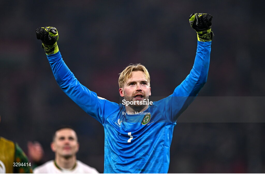 16 November 2025; Republic of Ireland goalkeeper Caoimhin Kelleher celebrates after the FIFA World Cup 2026 Group F Qualifier match between Hungary and Republic of Ireland at Puskás Aréna in Budapest, Hungary. Photo by Ben McShane/Sportsfile