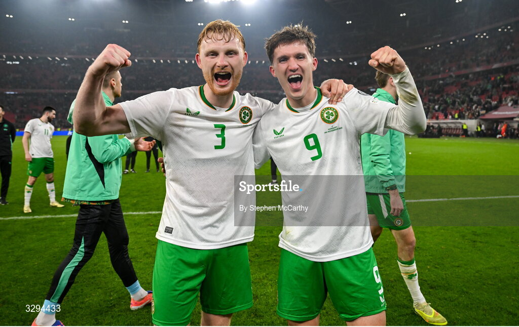 16 November 2025; Liam Scales, left, and Johnny Kenny of Republic of Ireland celebrate after the FIFA World Cup 2026 Group F Qualifier match between Hungary and Republic of Ireland at Puskás Aréna in Budapest, Hungary. Photo by Stephen McCarthy/Sportsfile