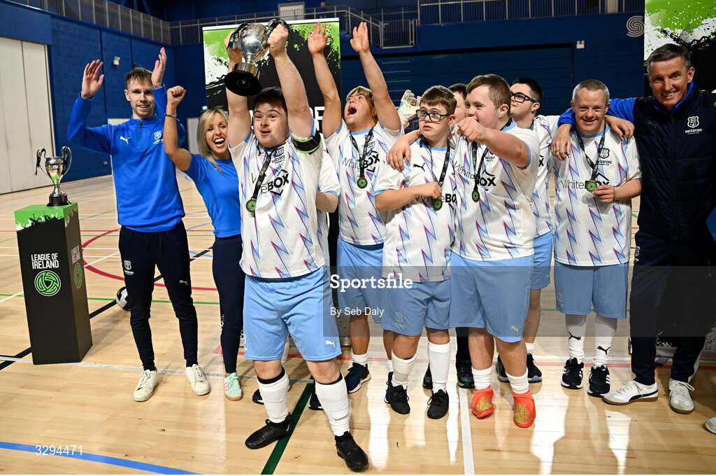 16 November 2025; Waterford captain Sean Toolin lifts the championship cup after his side's victory at LOI Cairdeas Cup Festival at the National Indoor Arena on the Sport Ireland Campus in Dublin. Photo by Seb Daly/Sportsfile