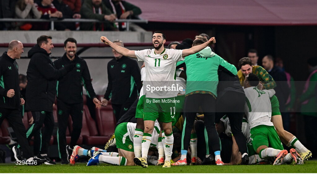 16 November 2025; Finn Azaz of Republic of Ireland celebrates his side's third goal, scored by Troy Parrott, during the FIFA World Cup 2026 Group F Qualifier match between Hungary and Republic of Ireland at Puskás Aréna in Budapest, Hungary. Photo by Ben McShane/Sportsfile