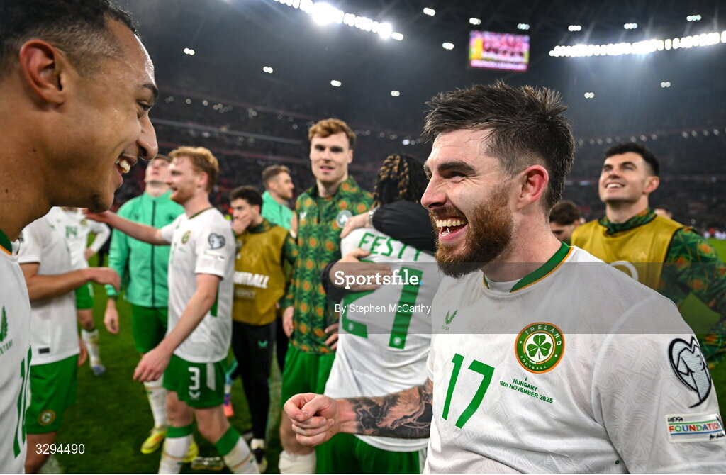 16 November 2025; Ryan Manning, right, and Adam Idah of Republic of Ireland celebrate after the FIFA World Cup 2026 Group F Qualifier match between Hungary and Republic of Ireland at Puskás Aréna in Budapest, Hungary. Photo by Stephen McCarthy/Sportsfile