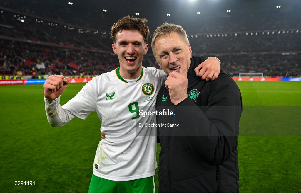 16 November 2025; Republic of Ireland head coach Heimir Hallgrimsson and Johnny Kenny of Republic of Ireland celebrate after the FIFA World Cup 2026 Group F Qualifier match between Hungary and Republic of Ireland at Puskás Aréna in Budapest, Hungary. Photo by Stephen McCarthy/Sportsfile