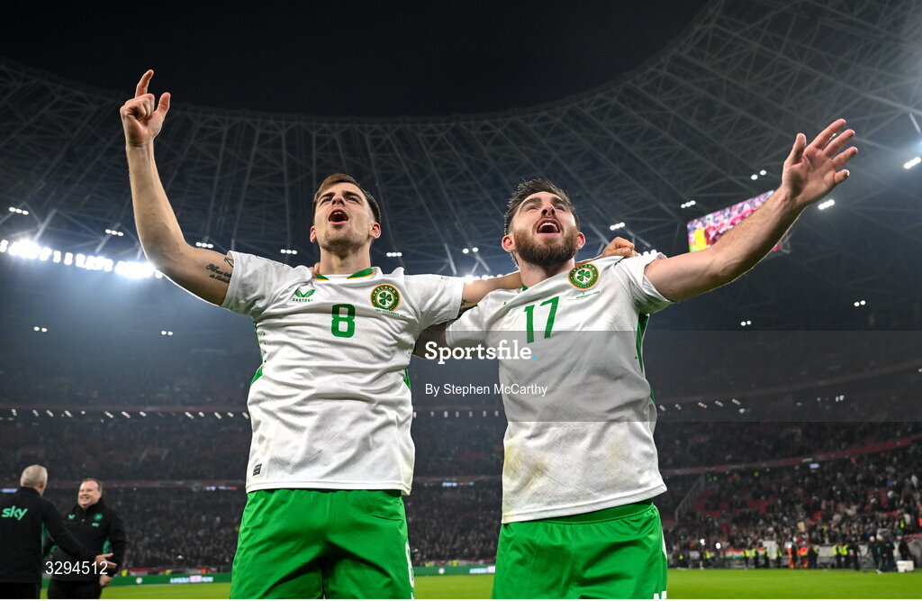 16 November 2025; Jayson Molumby, left, and Ryan Manning of Republic of Ireland celebrate after the FIFA World Cup 2026 Group F Qualifier match between Hungary and Republic of Ireland at Puskás Aréna in Budapest, Hungary. Photo by Stephen McCarthy/Sportsfile