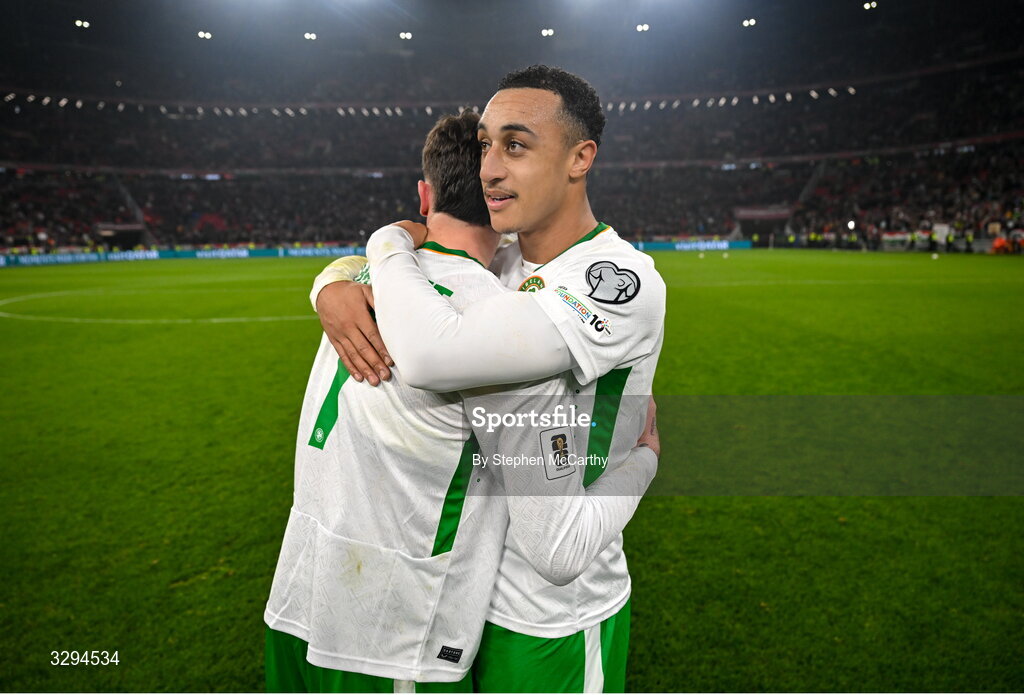 16 November 2025; Troy Parrott, left, and Adam Idah of Republic of Ireland celebrate after the FIFA World Cup 2026 Group F Qualifier match between Hungary and Republic of Ireland at Puskás Aréna in Budapest, Hungary. Photo by Stephen McCarthy/Sportsfile