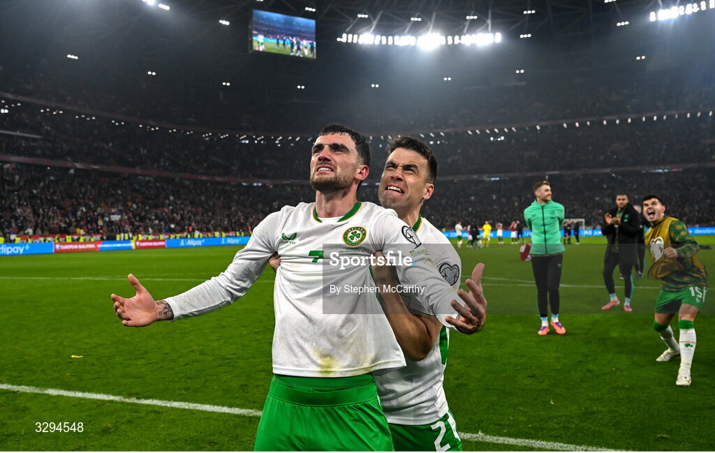 16 November 2025; Troy Parrott, left, and Seamus Coleman of Republic of Ireland celebrate after the FIFA World Cup 2026 Group F Qualifier match between Hungary and Republic of Ireland at Puskás Aréna in Budapest, Hungary. Photo by Stephen McCarthy/Sportsfile