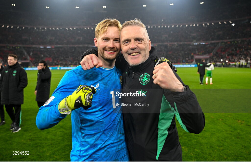 16 November 2025; Republic of Ireland goalkeeper Caoimhin Kelleher and Republic of Ireland goalkeeping coach Gudmundur Hreidarsson celebrate after the FIFA World Cup 2026 Group F Qualifier match between Hungary and Republic of Ireland at Puskás Aréna in Budapest, Hungary. Photo by Stephen McCarthy/Sportsfile