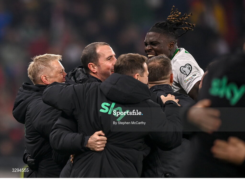 16 November 2025; Festy Ebosele of Republic of Ireland celebrates with Republic of Ireland head coach Heimir Hallgrimsson and Republic of Ireland assistant head coach John O'Shea after the FIFA World Cup 2026 Group F Qualifier match between Hungary and Republic of Ireland at Puskás Aréna in Budapest, Hungary. Photo by Stephen McCarthy/Sportsfile