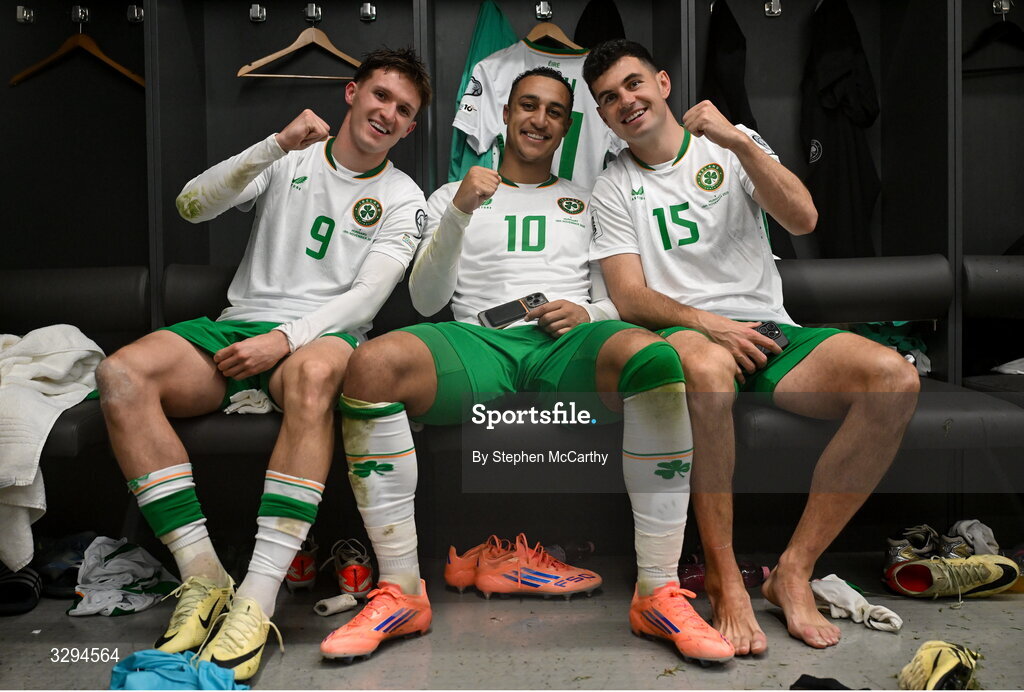 16 November 2025; Johnny Kenny, Adam Idah and John Egan of Republic of Ireland celebrate in the dressing room after the FIFA World Cup 2026 Group F Qualifier match between Hungary and Republic of Ireland at Puskás Aréna in Budapest, Hungary. Photo by Stephen McCarthy/Sportsfile