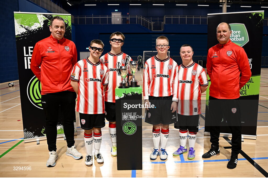 16 November 2025; Derry City players and coaches with the Cairdeas Cups before the LOI Cairdeas Cup Festival at the National Indoor Arena on the Sport Ireland Campus in Dublin. Photo by Seb Daly/Sportsfile