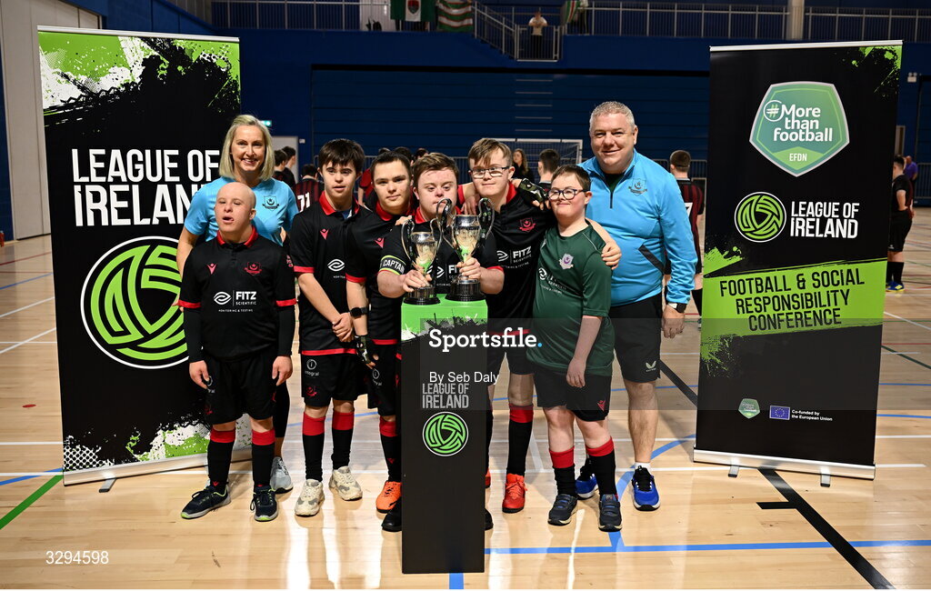 16 November 2025; Drogheda United players and coaches with the Cairdeas Cups before the LOI Cairdeas Cup Festival at the National Indoor Arena on the Sport Ireland Campus in Dublin. Photo by Seb Daly/Sportsfile