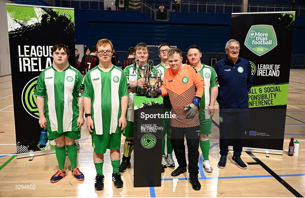 16 November 2025; Bray Wanderers players and coaches with the Cairdeas Cups before the LOI Cairdeas Cup Festival at the National Indoor Arena on the Sport Ireland Campus in Dublin. Photo by Seb Daly/Sportsfile