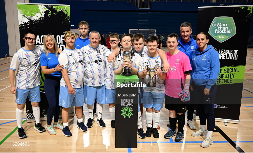 16 November 2025; Waterford players and coaches with the Cairdeas Cups before the LOI Cairdeas Cup Festival at the National Indoor Arena on the Sport Ireland Campus in Dublin. Photo by Seb Daly/Sportsfile
