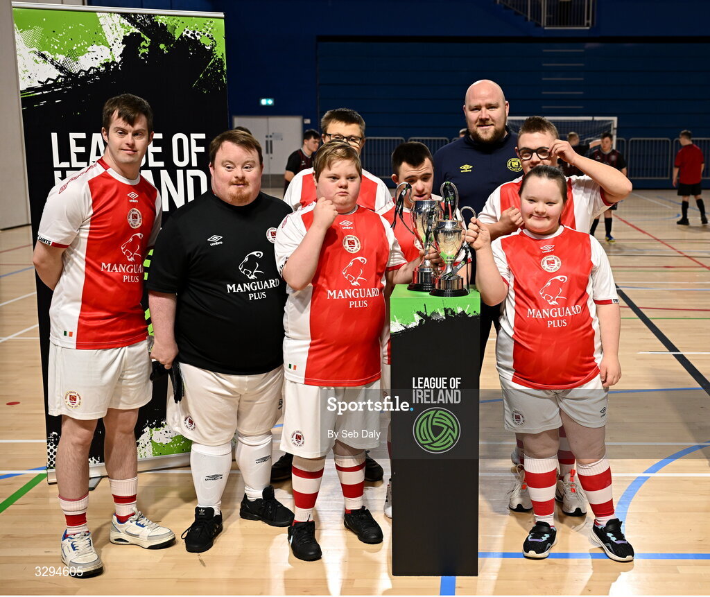 16 November 2025; St Patrick's Athletic players and coaches with the Cairdeas Cups before the LOI Cairdeas Cup Festival at the National Indoor Arena on the Sport Ireland Campus in Dublin. Photo by Seb Daly/Sportsfile