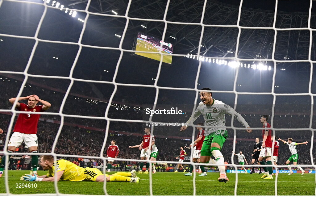 16 November 2025; Adam Idah of Republic of Ireland celebrates his side's third goal, scored by Troy Parrott, during the FIFA World Cup 2026 Group F Qualifier match between Hungary and Republic of Ireland at Puskás Aréna in Budapest, Hungary. Photo by Stephen McCarthy/Sportsfile