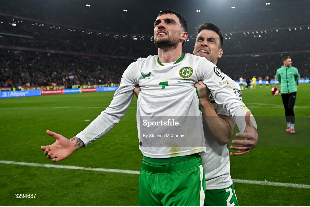16 November 2025; Troy Parrott, left, and Seamus Coleman of Republic of Ireland celebrate after the FIFA World Cup 2026 Group F Qualifier match between Hungary and Republic of Ireland at Puskás Aréna in Budapest, Hungary.  Photo by Stephen McCarthy/Sportsfile