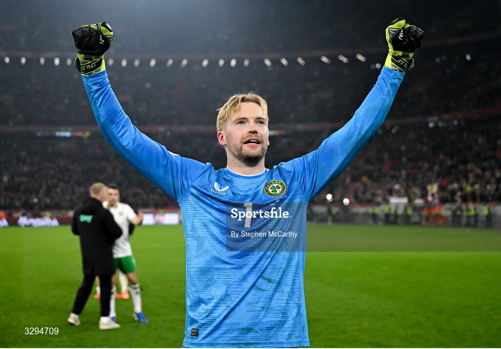 16 November 2025; Republic of Ireland goalkeeper Caoimhin Kelleher celebrates after the FIFA World Cup 2026 Group F Qualifier match between Hungary and Republic of Ireland at Puskás Aréna in Budapest, Hungary. Photo by Stephen McCarthy/Sportsfile