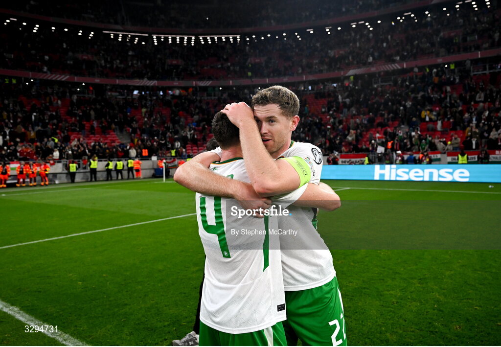 16 November 2025; Nathan Collins, right, and Dara O'Shea of Republic of Ireland celebrate after the FIFA World Cup 2026 Group F Qualifier match between Hungary and Republic of Ireland at Puskás Aréna in Budapest, Hungary. Photo by Stephen McCarthy/Sportsfile