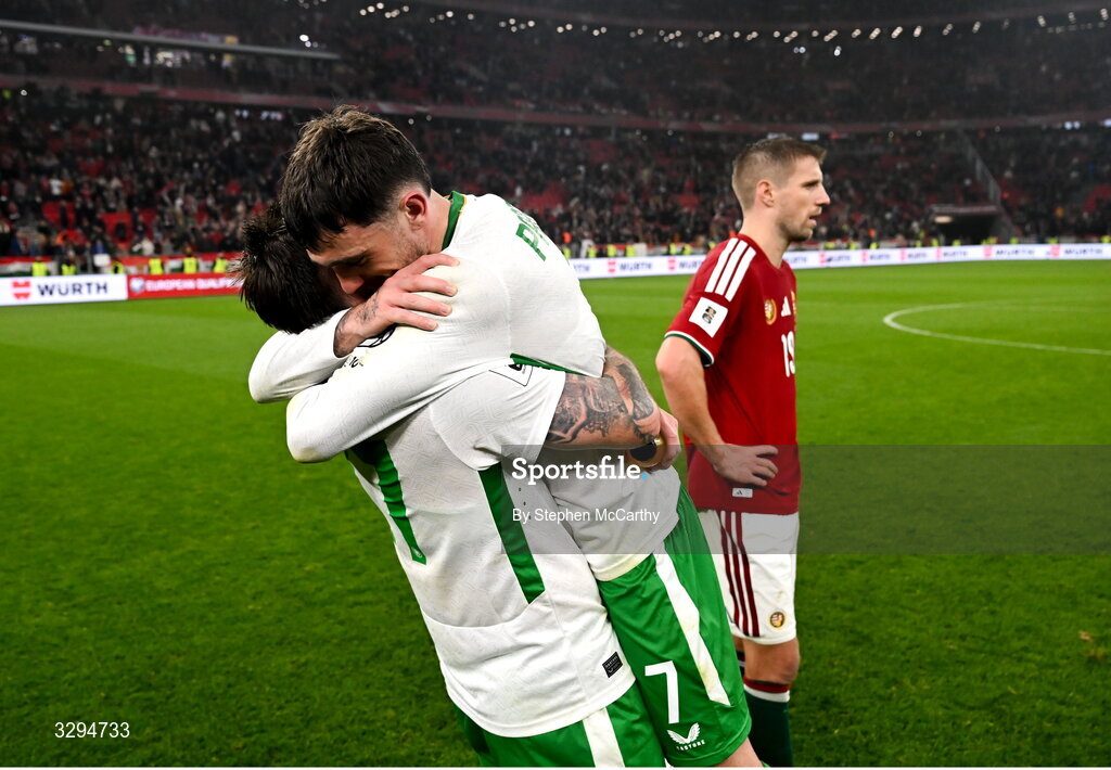 16 November 2025; Troy Parrott, right, and Ryan Manning of Republic of Ireland celebrate after the FIFA World Cup 2026 Group F Qualifier match between Hungary and Republic of Ireland at Puskás Aréna in Budapest, Hungary. Photo by Stephen McCarthy/Sportsfile