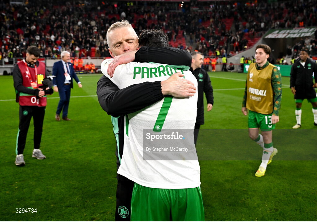 16 November 2025; Republic of Ireland goalkeeping coach Gudmundur Hreidarsson and Troy Parrott celebrate after the FIFA World Cup 2026 Group F Qualifier match between Hungary and Republic of Ireland at Puskás Aréna in Budapest, Hungary. Photo by Stephen McCarthy/Sportsfile