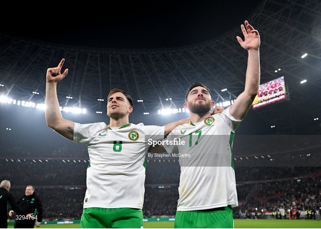 16 November 2025; Jayson Molumby, left, and Ryan Manning of Republic of Ireland celebrate after the FIFA World Cup 2026 Group F Qualifier match between Hungary and Republic of Ireland at Puskás Aréna in Budapest, Hungary. Photo by Stephen McCarthy/Sportsfile