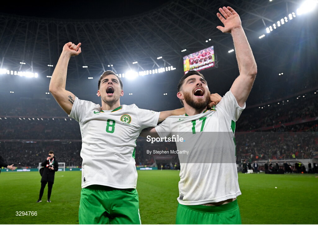 16 November 2025; Jayson Molumby, left, and Ryan Manning of Republic of Ireland celebrate after the FIFA World Cup 2026 Group F Qualifier match between Hungary and Republic of Ireland at Puskás Aréna in Budapest, Hungary. Photo by Stephen McCarthy/Sportsfile