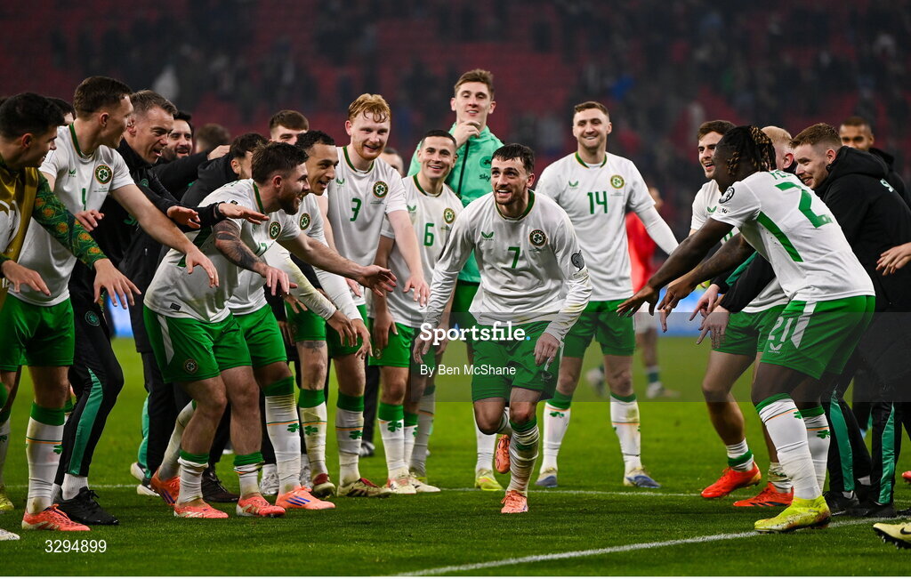 16 November 2025; Republic of Ireland players, including Troy Parrott, centre, celebrate after the FIFA World Cup 2026 Group F Qualifier match between Hungary and Republic of Ireland at Puskás Aréna in Budapest, Hungary. Photo by Ben McShane/Sportsfile