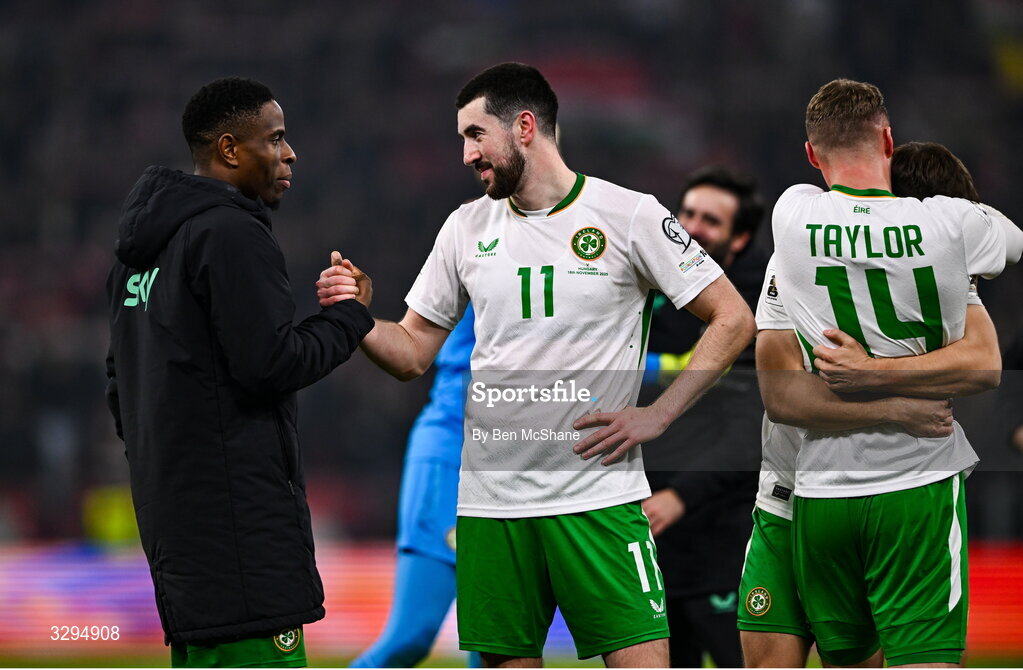 16 November 2025; Chiedozie Ogbene, left, and Finn Azaz of Republic of Ireland celebrate after the FIFA World Cup 2026 Group F Qualifier match between Hungary and Republic of Ireland at Puskás Aréna in Budapest, Hungary. Photo by Ben McShane/Sportsfile