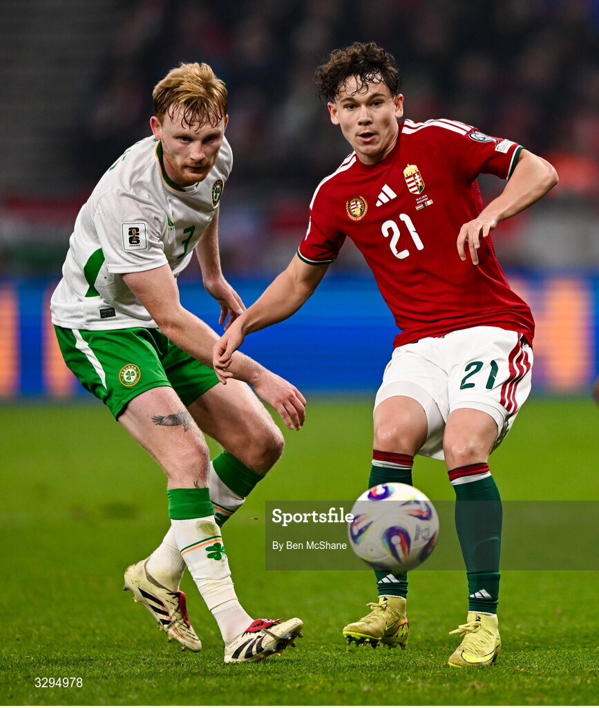 16 November 2025; Alex Tóth of Hungary and Liam Scales of Republic of Ireland during the FIFA World Cup 2026 Group F Qualifier match between Hungary and Republic of Ireland at Puskás Aréna in Budapest, Hungary. Photo by Ben McShane/Sportsfile