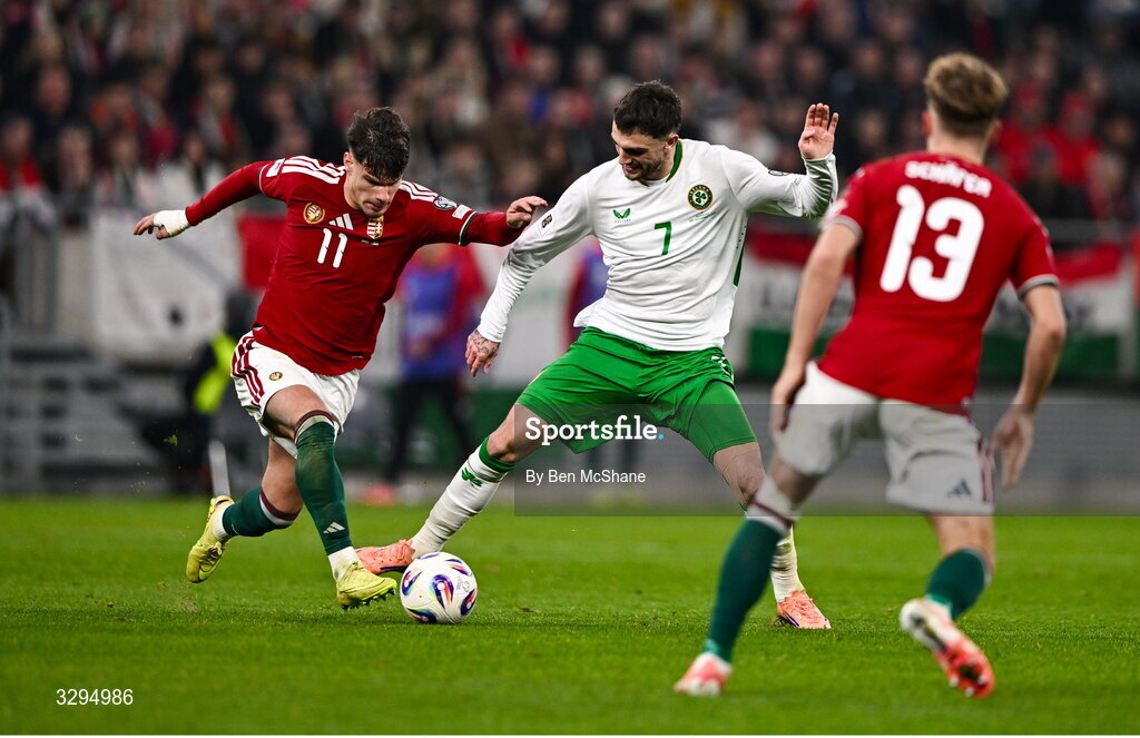 16 November 2025; Troy Parrott of Republic of Ireland and Milos Kerkez of Hungary during the FIFA World Cup 2026 Group F Qualifier match between Hungary and Republic of Ireland at Puskás Aréna in Budapest, Hungary. Photo by Ben McShane/Sportsfile