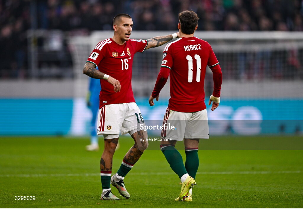 16 November 2025; Dániel Lukács, left, with Hungary teammate Milos Kerkez during the FIFA World Cup 2026 Group F Qualifier match between Hungary and Republic of Ireland at Puskás Aréna in Budapest, Hungary. Photo by Ben McShane/Sportsfile