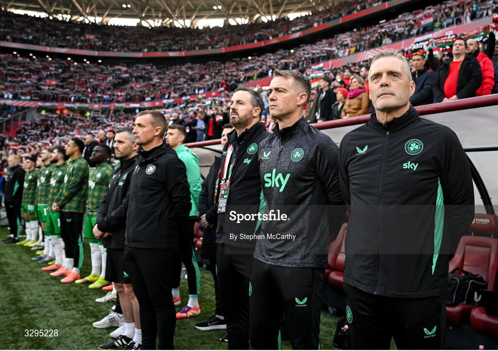 16 November 2025; Republic of Ireland staff, from right, goalkeeping coach Gudmundur Hreidarsson, head of athletic performance Damien Doyle, analyst Ger Dunne, lead physiotherapist Danny Miller and physiotherapist Cian McCaffrey before the FIFA World Cup 2026 Group F Qualifier match between Hungary and Republic of Ireland at Puskás Aréna in Budapest, Hungary. Photo by Stephen McCarthy/Sportsfile